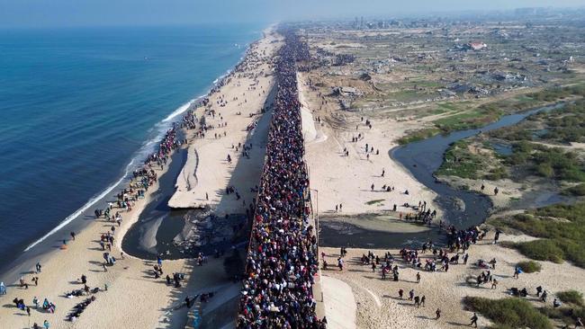 Donald Trump has vowed to take over Gaza and transform it into a Middle East jobs hub. Pictured are displaced Gazans crossing the Netzarim corridor to the enclave’s north. Picture: AFP