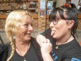 Debbie Weaver, who is taking on the "U.G.L.Y" bartender challenge at Lawrence Tavern gets a bit of a razz from Siobhan Hoy. Picture: Adam Hourigan