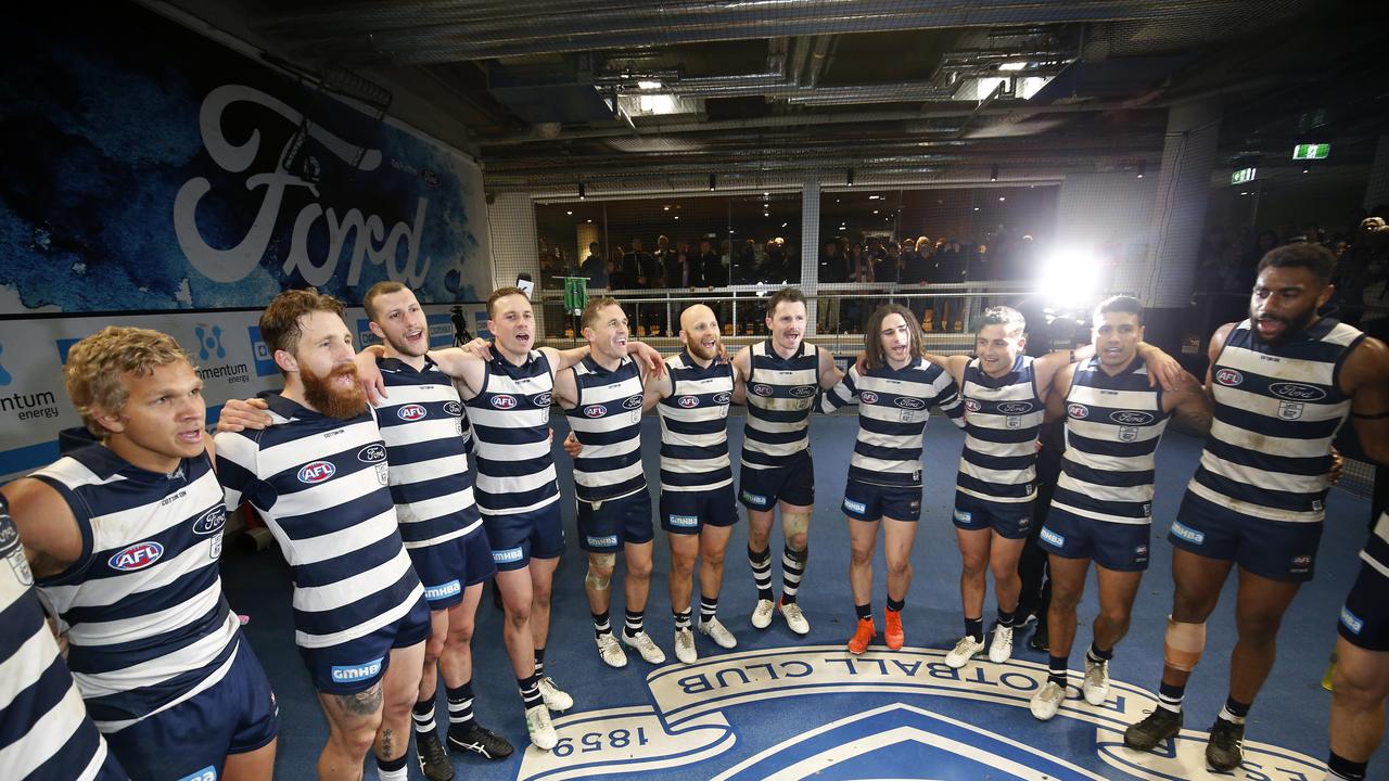 Geelong Cats players sing the song after a win in August.