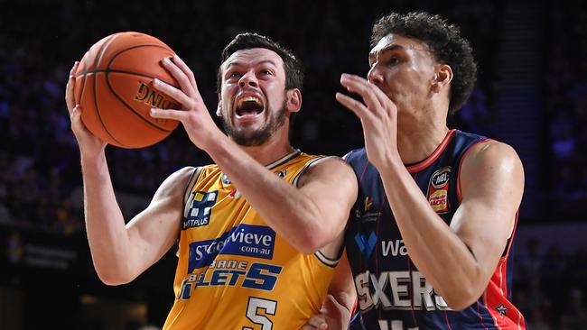 Jason Cadee in action against the 36ers.