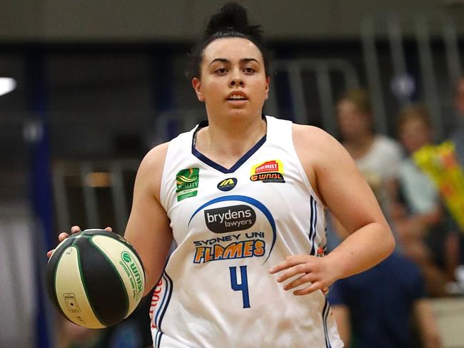 DANDENONG, AUSTRALIA - OCTOBER 19: Tahlia Tupaea of the Flames dribbles the ball during the round two WNBL match between Dandenong and Sydney Uni on October 19, 2018 in Dandenong, Australia. (Photo by Kelly Defina/Getty Images)