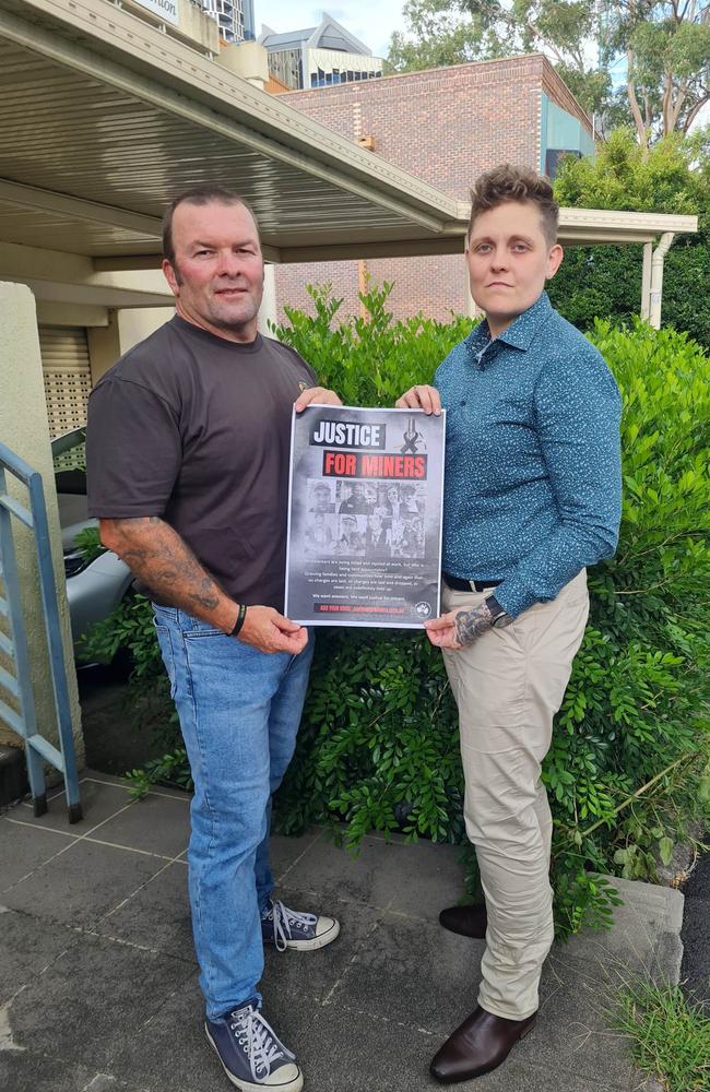 Mining Union Queensland district president Stephen Smyth and Leesh Dawson, whose father Graham Dawson was crushed by a collapsing roof at Crinum Mine, calling for justice for miners killed at work.