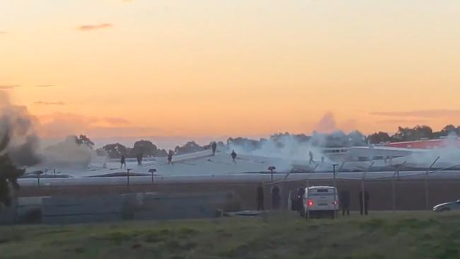 Prisoners rioting on the roof of Parklea Correctional Centre in July. Picture: 7 News via NCA NewsWire