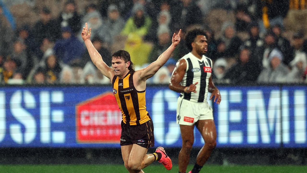 MELBOURNE, AUSTRALIA – JULY 20: Nick Watson of the Hawks (L) celebrates kicking a goal during the round 19 AFL match between Hawthorn Hawks and Collingwood Magpies at Melbourne Cricket Ground on July 20, 2024 in Melbourne, Australia. (Photo by Graham Denholm/AFL Photos/via Getty Images)