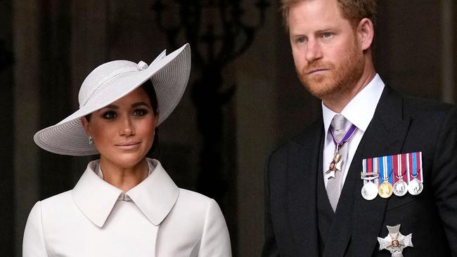 (FILES) Britain's Prince Harry, Duke of Sussex, and Britain's Meghan, Duchess of Sussex, leave at the end of the National Service of Thanksgiving for The Queen's reign at Saint Paul's Cathedral in London on June 3, 2022 as part of Queen Elizabeth II's platinum jubilee celebrations. Prince Harry and wife Meghan Markle were involved in a "near catastrophic car chase" involving paparazzi in New York late on May 16, 2023, a spokesperson for the couple said May 17. "This relentless pursuit, lasting over two hours, resulted in multiple near collisions involving other drivers on the road, pedestrians and two NYPD officers," the spokesperson added. (Photo by Matt Dunham / POOL / AFP)