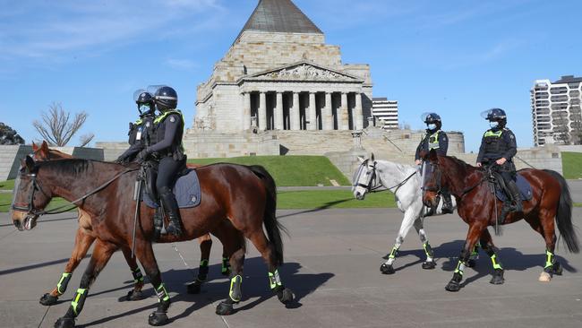 Police patrol the Shrine of Remembrance. Picture: David Crosling