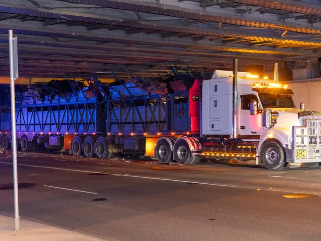 The truck became wedged under the bridge. Picture: Jake Nowakowski