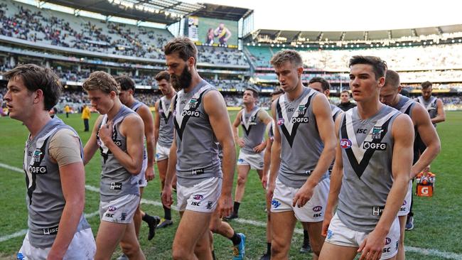 Power players leave the field after losing to Richmond. Picture: Scott Barbour/Getty Images