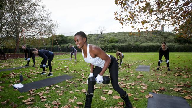 Flow Athletic bootcamp instructor, Sheron Sultan, runs a strength class in Centennial Park, Sydney, this morning (15/05/2020). Bootcamps reopened today allowing up to ten people to participate after Covid 19 restrictions are being eased. Pic Liam Driver