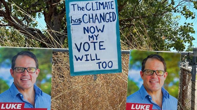 Justine Davis’ old NT election corflutes were used by mystery persons and repurposed for unauthorised federal election posters. Here one is positioned between Federal Labor Member for Solomon Luke Gosling’s authorised corflutes.