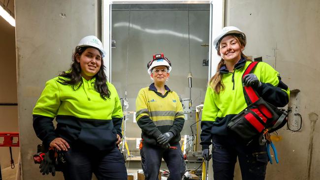 Three women workers at a construction site in Melbourne. From left, Maisarah Ghazali-Wilson, Sarah Tabone and Lily Blandford. Picture: Tim Carrafa