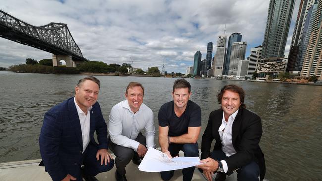 Mayor Adrian Schrinner, Deputy Premier Steven Miles, Luke Fraser and Adam Flaskas on a pontoon. Picture: Annette Dew