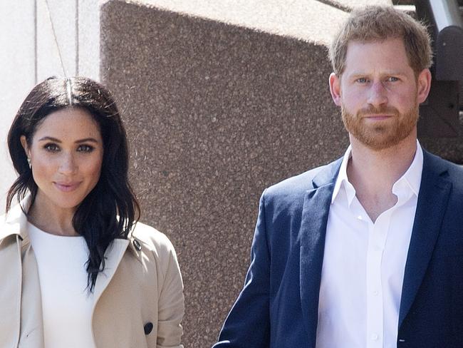 SYDNEY, AUSTRALIA - OCTOBER 16: Prince Harry, Duke of Sussex and Meghan, Duchess of Sussex meet and greet the public at the Sydney Opera House on October 16, 2018 in Sydney, Australia. The Duke and Duchess of Sussex are on their official 16-day Autumn tour visiting cities in Australia, Fiji, Tonga and New Zealand. (Photo by Paul Edwards - Pool/Getty Images)