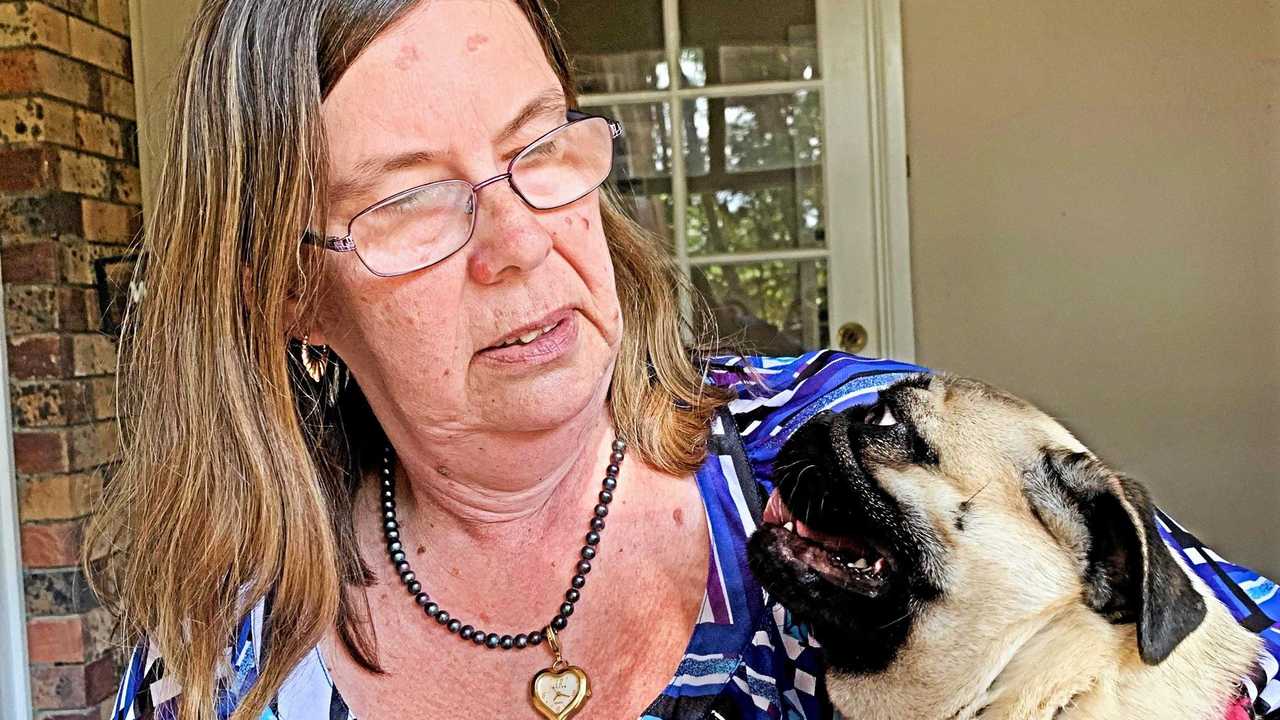 PUPPY LOVE: Julie Peters and Kensi after being reunited following the dogs little misadventure at Foxbar Falls. Picture: Contributed