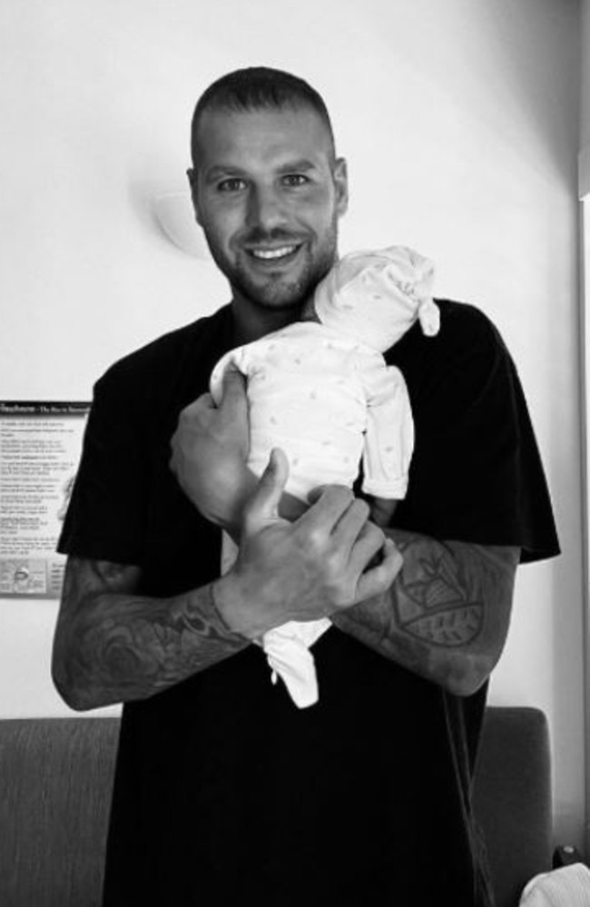 Lance Franklin and his new baby boy.