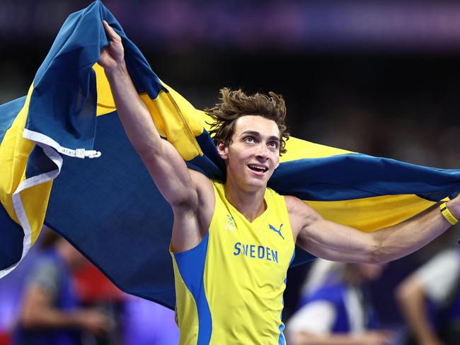 Sweden's Armand Duplantis celebrates a gold medal and new world record. Picture: Anne-Christine Poujoulat / AFP