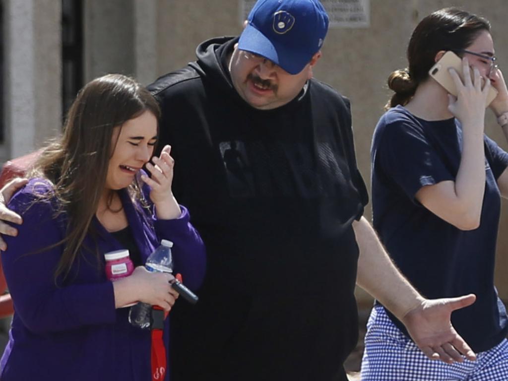 People arrive at MacArthur Elementary looking for family and friends. Picture: Supplied