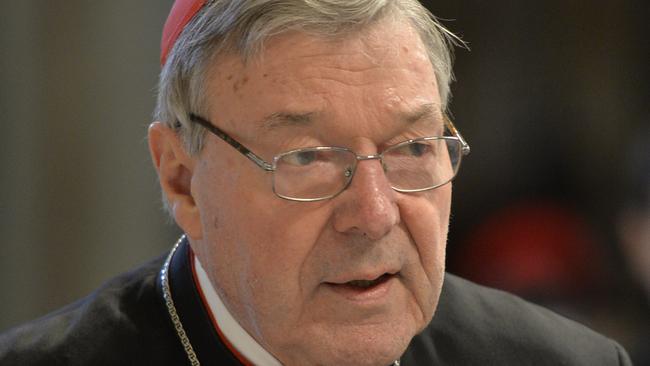 Australian Cardinal George Pell, Prefect of the Secretariat for the Economy of the Holy See arrives to attend a Chrism mass for Holy Thursday (Maundy Thursday) which marks the start of Easter celebrations on April 2, 2015 at St Peter's basilica in Vatican. AFP PHOTO / ANDREAS SOLARO