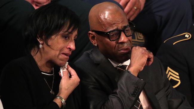 Evelyn Rodriguez and Freddy Cuevas, parents of children who were murdered by crime gang MS-13, watch President Trump’s speech. Picture: Getty