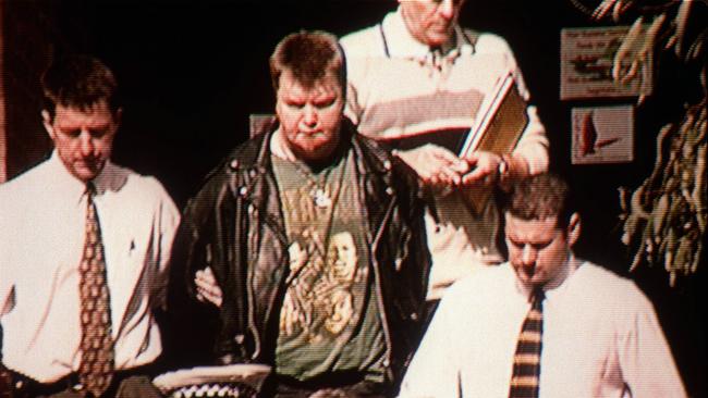 Jonathon Brett Horrocks taken into police custody in 1999. Picture: Channel 7 News