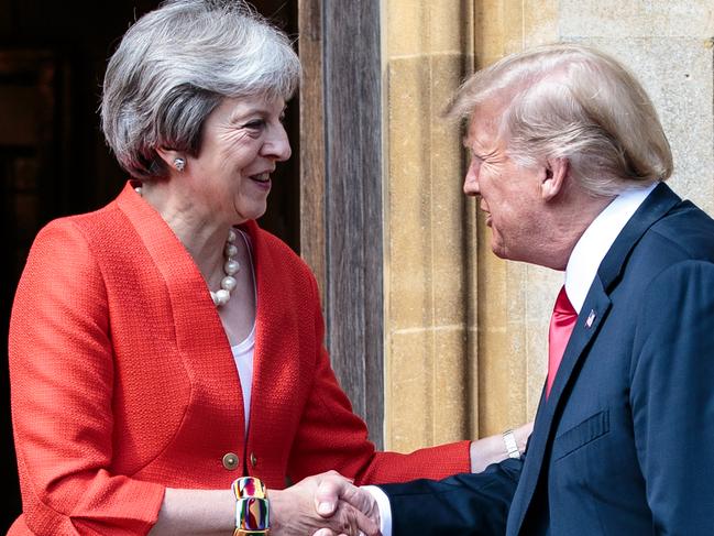 AYLESBURY, ENGLAND - JULY 13: Prime Minister Theresa May greets U.S. President Donald Trump at Chequers on July 13, 2018 in Aylesbury, England. US President, Donald Trump, held bi-lateral talks with British Prime Minister, Theresa May at her grace-and-favour country residence, Chequers. Earlier British newspaper, The Sun, revealed criticisms of Theresa May and her Brexit policy made by President Trump in an exclusive interview. Later today The President and First Lady will join Her Majesty for tea at Windosr Castle. (Photo by Jack Taylor - WPA Pool /Getty Images)