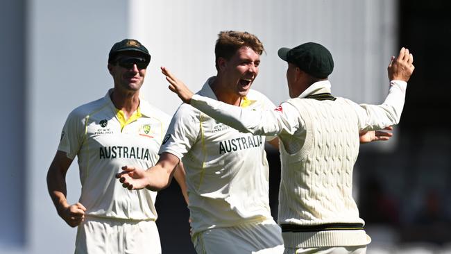 Cameron Green of Australia celebrates the wicket of Cheteshwar Pujara of India during day two of the ICC World Test Championship Final between Australia and India at The Oval.