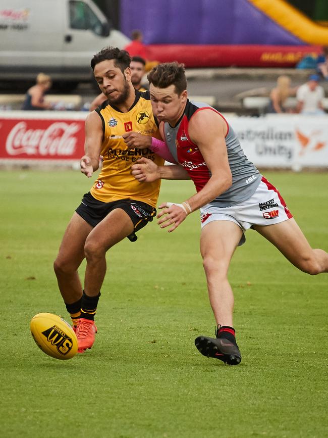 Glenelg’s Ian Milera battles for the ball in Fast Footy 2018. Picture: AAP/Matt Loxton