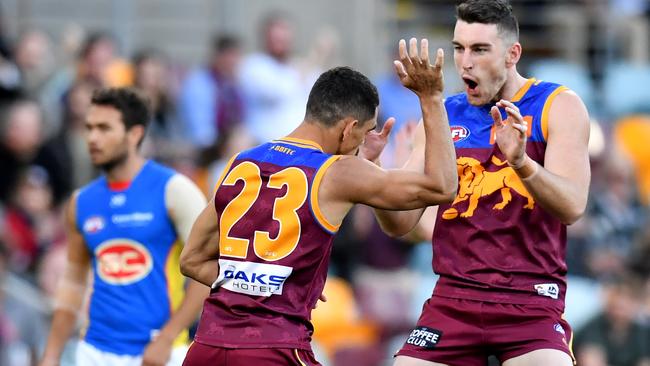 Charlie Cameron and McStay celebrate another goal. Pic: AAP