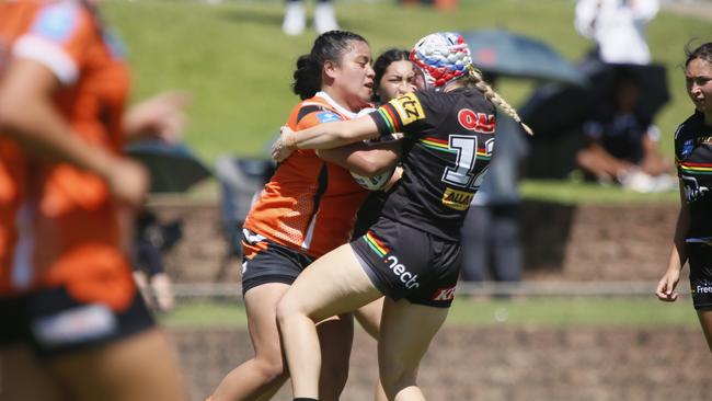 May Fuimaono (left) crashes into Penrith’s Ariah Gilbert during an entertaining Lisa Fiaola clash. Picture: Warren Gannon Photography