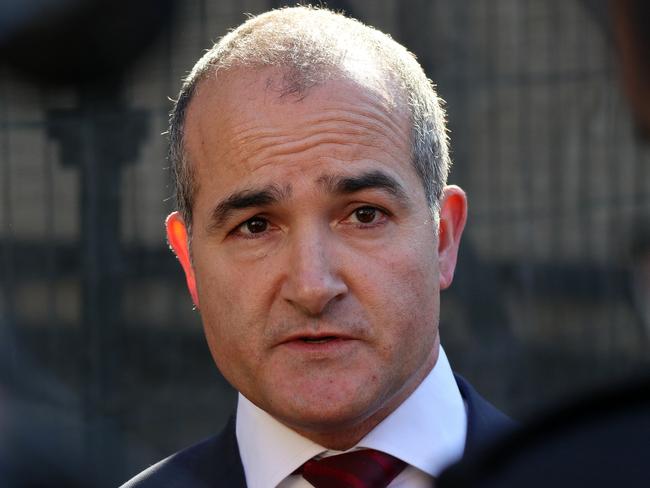 Victorian Deputy Premier James Merlino speaks to the media outside Parliament House in Melbourne, Tuesday, September 4, 2018. Merlino on Tuesday demanded Victorian Opposition Leader Matthew Guy resign as Guy defended the payout of millions of dollars in taxpayer funds to settle a legal case over a planning decision made when he was a Liberal minister. On Monday, the state Labor took the unprecedented step of tabling 80,000 pages of confidential documents from Mr Guy's tenure as planning minister in the previous government. (AAP Image/Alex Murray) NO ARCHIVING