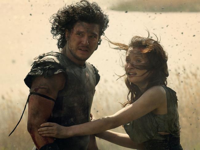 Kit Harington with Emily Browning in a scene from the film Pompeii.