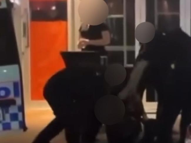 A review into an allegedly violent arrest in the heart of Maroochydoreâs nightlife precinct is underway after a police officer was allegedly caught on camera punching a restrained man in the head.