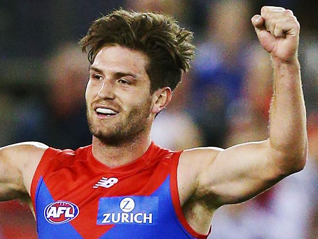 MELBOURNE, AUSTRALIA - FEBRUARY 16:  Tomas Bugg of the Demons celebrates the win after the final in the final during the AFLX match between Hawthorn Hawks and Melbourne Demons at Etihad Stadium on February 16, 2018 in Melbourne, Australia.  (Photo by Michael Dodge/Getty Images)