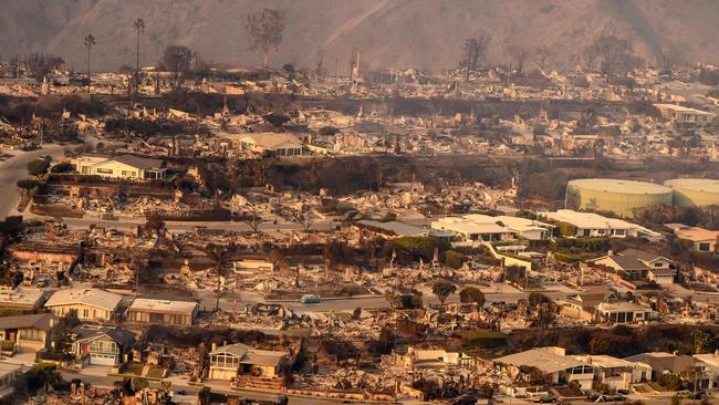 More homes burned from the Palisade fire as seen from a helicopter. Picture: AFP