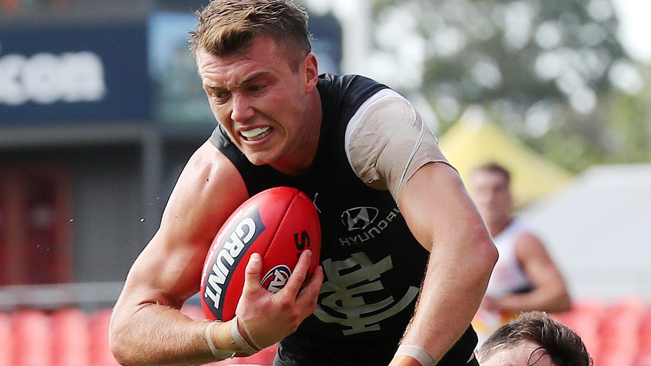 AFL Round 17. 13/09/2020. Carlton vs Adelaide at Metricon Stadium, Gold Coast.. Patrick Cripps of the Blues tackled by Jake Kelly of the Crows q2 . Pic: Michael Klein