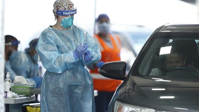 A person is tested for COVID-19 at a pop-up test site in Hallam. Picture: NCA NewsWire / Daniel Pockett