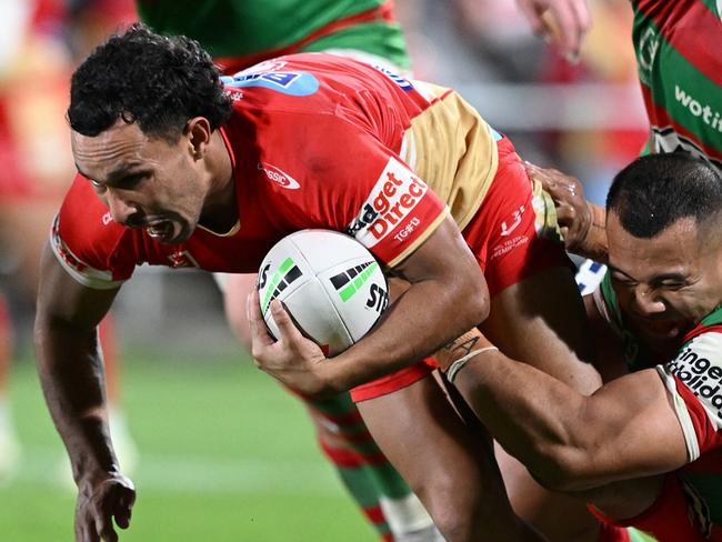 BRISBANE, AUSTRALIA - JULY 11: Trai Fuller of the Dolphins is tackled during the round 19 NRL match between Dolphins and South Sydney Rabbitohs at Kayo Stadium, on July 11, 2024, in Brisbane, Australia. (Photo by Bradley Kanaris/Getty Images)