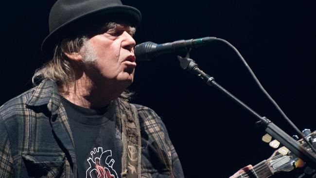 Neil Young says ‘Spotify is spreading fake information about vaccines – potentially causing death to those who believe the disinformation being spread by them’. Picture: AFP