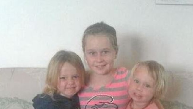 Jade Carney with her younger siblings.