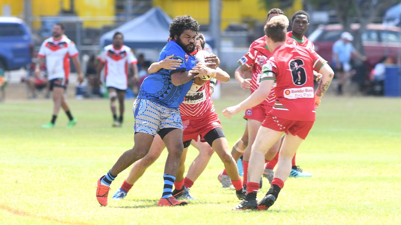RUGBY LEAGUE - A DAY AT THE PARK: Woorabinda Warriors I's Buddy Williams with the ball