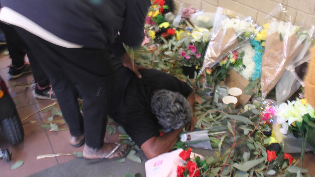 Family grieve during a vigil at Coles. Picture: Gera Kazakov