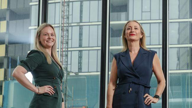 Jess Wilkie  (R) and  Jess Sykes the Hotel Queens with the construction of tower 2 progressing at pace, highlight 2 of the women who are running the project for The Star. Picture: Glenn Campbell