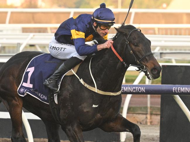 MELBOURNE, AUSTRALIA - JULY 06: Jamie Mott riding Munhamek winning race 8, the Vrc-crv Winter Championship Series Final - Betting Odds  during Melbourne Racing at Flemington Racecourse on July 06, 2024 in Melbourne, Australia. (Photo by Vince Caligiuri/Getty Images)