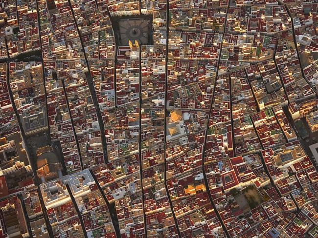 Jassen Todorov from the USA took this shot, The Labyrinth, showing the town of Cadiz, Spain from a plane ‘during the golden hour’. ‘(Cadiz) is as fascinating as it is from ground level — charming streets, narrow alleys, beautiful architecture, fun markets and people, glorious churches. It has got it all — now go visit and get lost for a while,’ Todorov writes.