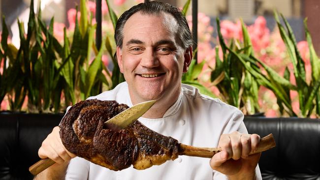 SkyCity Adelaide Director of Kitchens, Paul Barton with a Mayura Station Tomohawk steak at Sean’s Kitchen Picture: Matt Loxton