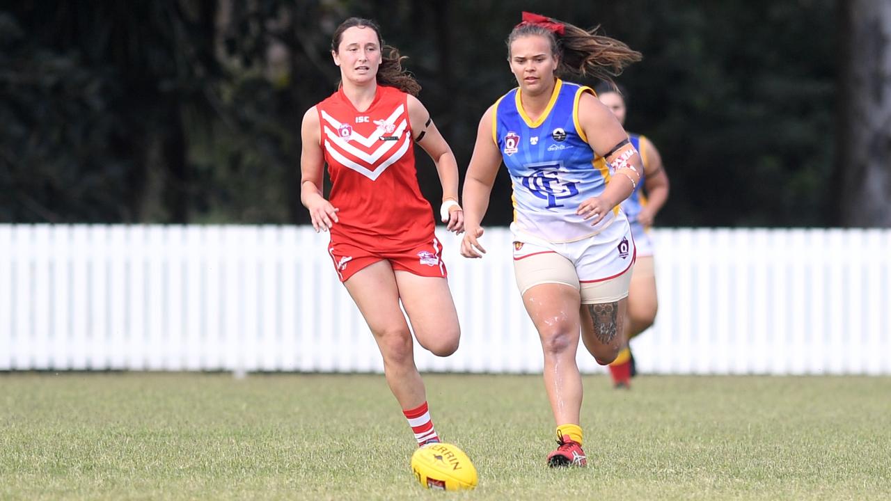 Yeppoon Swanettes player Ella Calleja (left) in a race for the ball in last weekend’s semi against Gladstone. Photo: Jann Houley