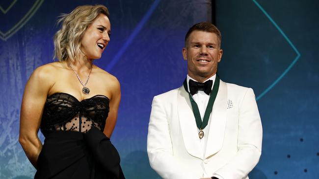 Ellyse Perry, pictured with David Warner at the Cricket Australia Awards in Melbourne, scored 783 runs in all formats. Picture: Daniel Pockett/Getty Images)