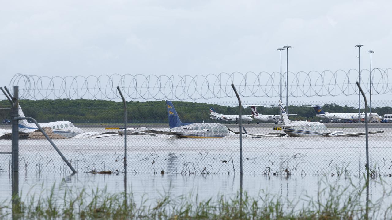 Cairns Airport closed flights as flood water from ex Tropical Cyclone Jasper caused severe flooding at the approach and departure zones as well as the taxi strip on the runway on Sunday, December 17. Picture: Brendan Radke