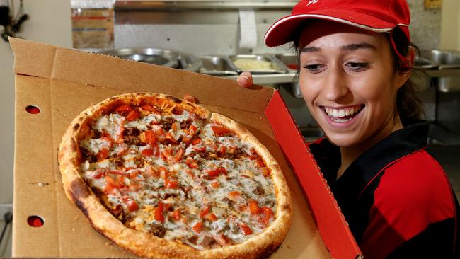 Don’t be fooled by its name. This pizza from Papa Mias Wood Oven Pizza that Kamila Wedanka is holding really is vegan! Picture: Calum Robertson