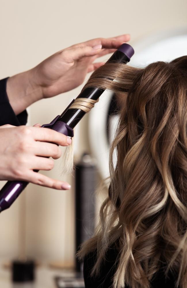 File photo of a hairdresser at work.